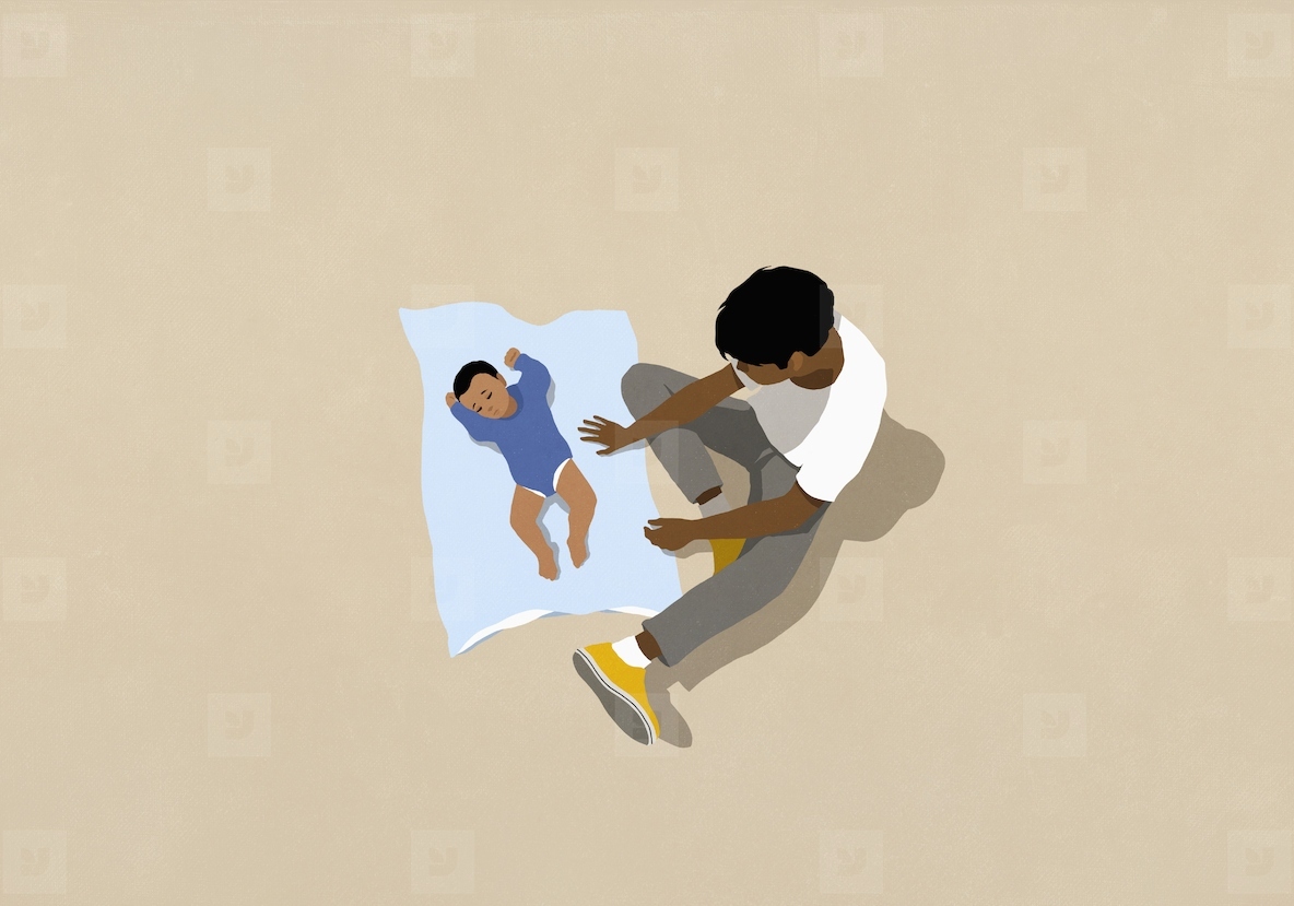 High angle view father watching baby son sleeping on blanket