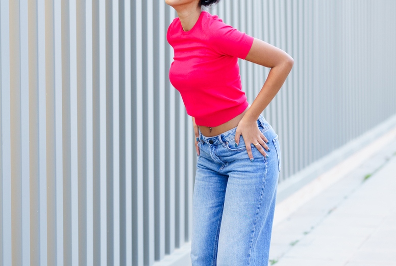 Dynamic Fashion Photoshoot Featuring a Model in a Trendy Outfit with Stylish Hair Movement