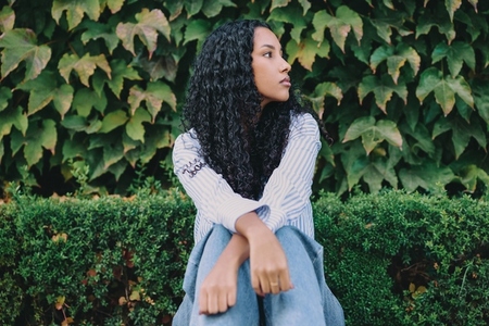 A Serene Reflection Amidst Lush Greenery That Evokes Calm and Peaceful Contemplation