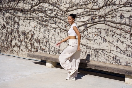 A Stunning and Elegant Fashion Portrait Set Against a Beautiful Textured Wall Background