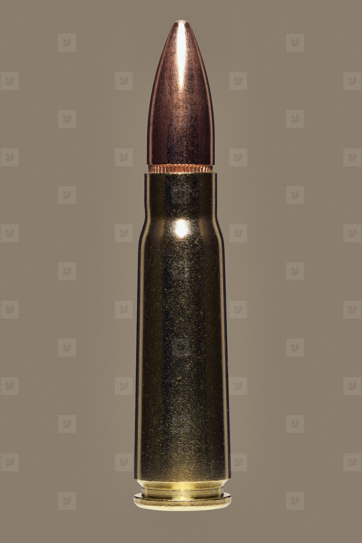 Close up studio shot of 39mm bullet used with AK47