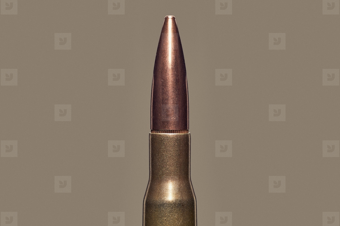 Close up studio shot 50 BMG bullet cartridge