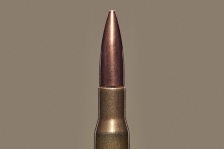 Close up studio shot 50 BMG bullet cartridge