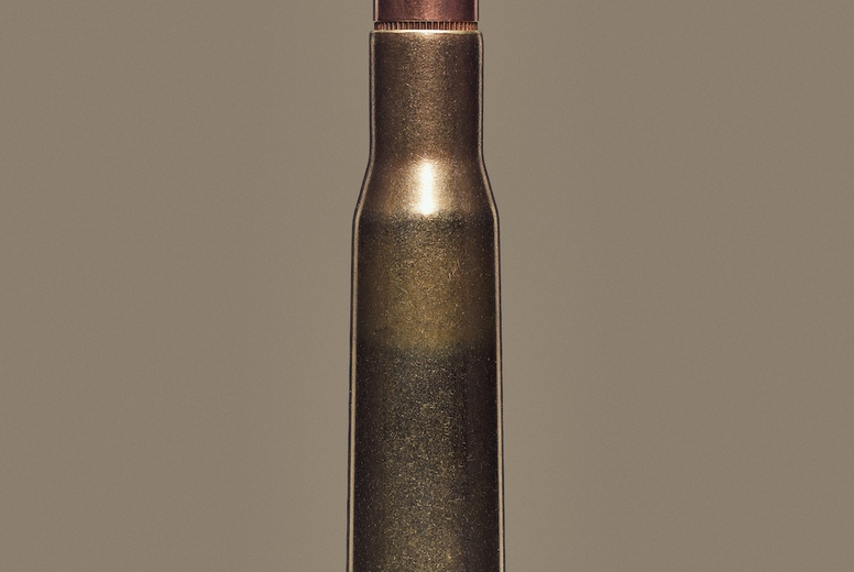 Close up studio shot of 50 BMG bullet