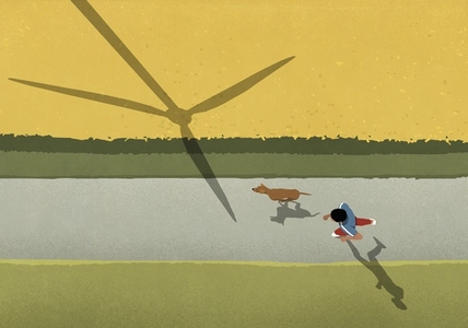 View from above man and dog jogging on path along field