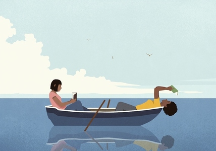 Young women relaxing reading books in rowboat on water