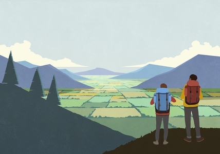 Father and son backpacking enjoying scenic landscape view