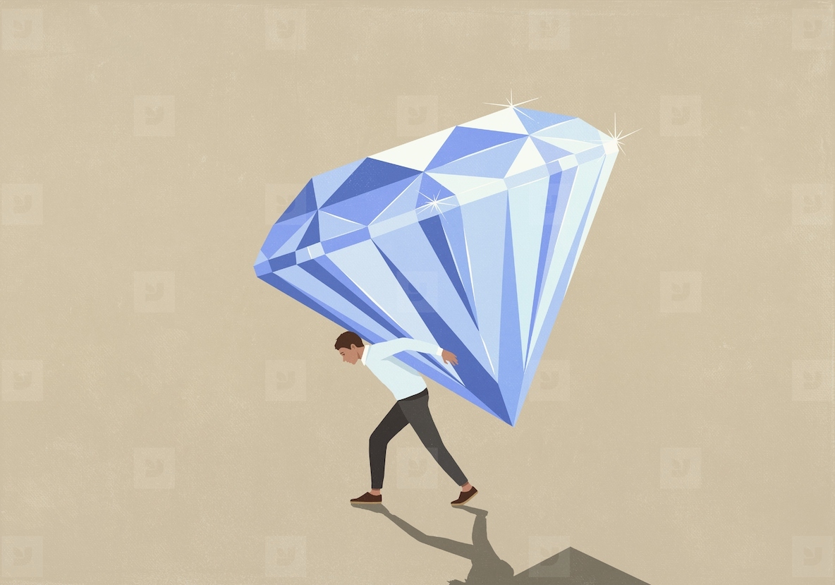 Man carrying large heavy shiny diamond on back