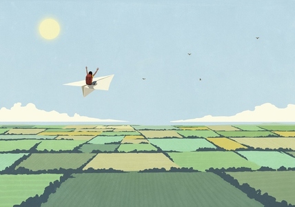 Carefree woman with backpack flying on paper airplane over sunny