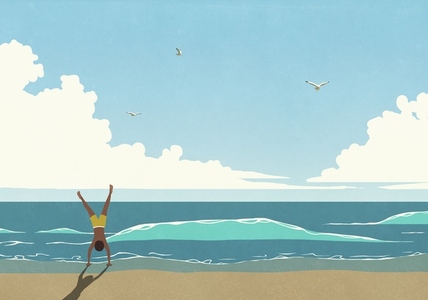 Carefree man doing handstand on sunny Carefree man doing handstand on sunny