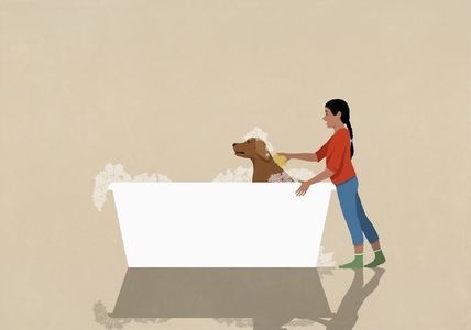 Girl giving dog bubble bath