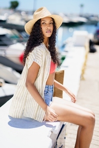 A Vibrant and Stylish Summer Look Showcased by the Marina Featuring a Young Model