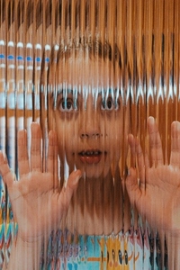 Girl Looking Up and Glass with Hands