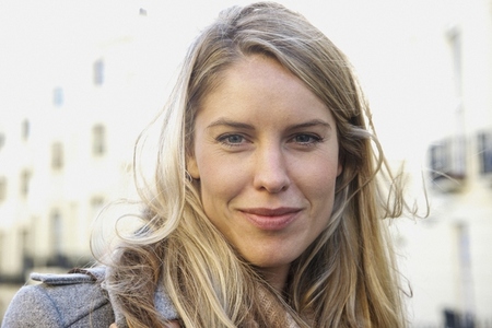 Close up portrait of beautiful blond woman in city street Close up portrait of beautiful blond woman in city street