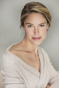 Studio portrait of beautiful confident blond woman