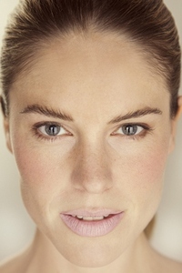 Close up portrait of beautiful woman with blue eyes