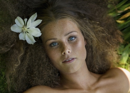 View from above portrait of beautiful young woman with brown hair View from above portrait of beautiful young woman with brown hair