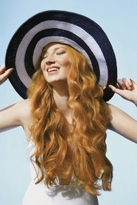 Portrait of carefree young woman with long