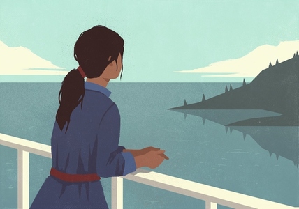 Serene woman enjoying scenic view of blue lake from waterfront balcony