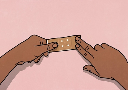 Point of view from above of hands flattening bandage over pink background