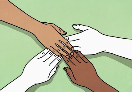 View from above of multiracial hands touching in connection against green background