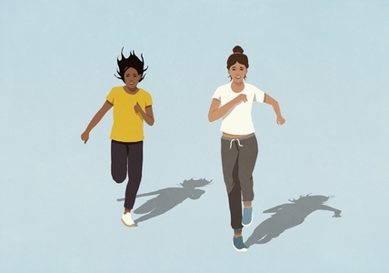 Young women running on blue background