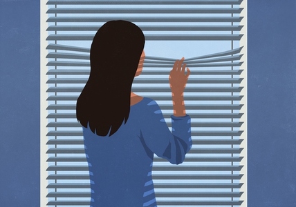 Suspicious woman standing at window Suspicious woman standing at window