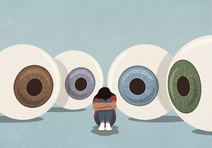 Large multicolored eyeballs staring at woman trying to hide with head down and arms wrapped Large multicolored eyeballs staring at woman trying to hide with head down and arms wrapped