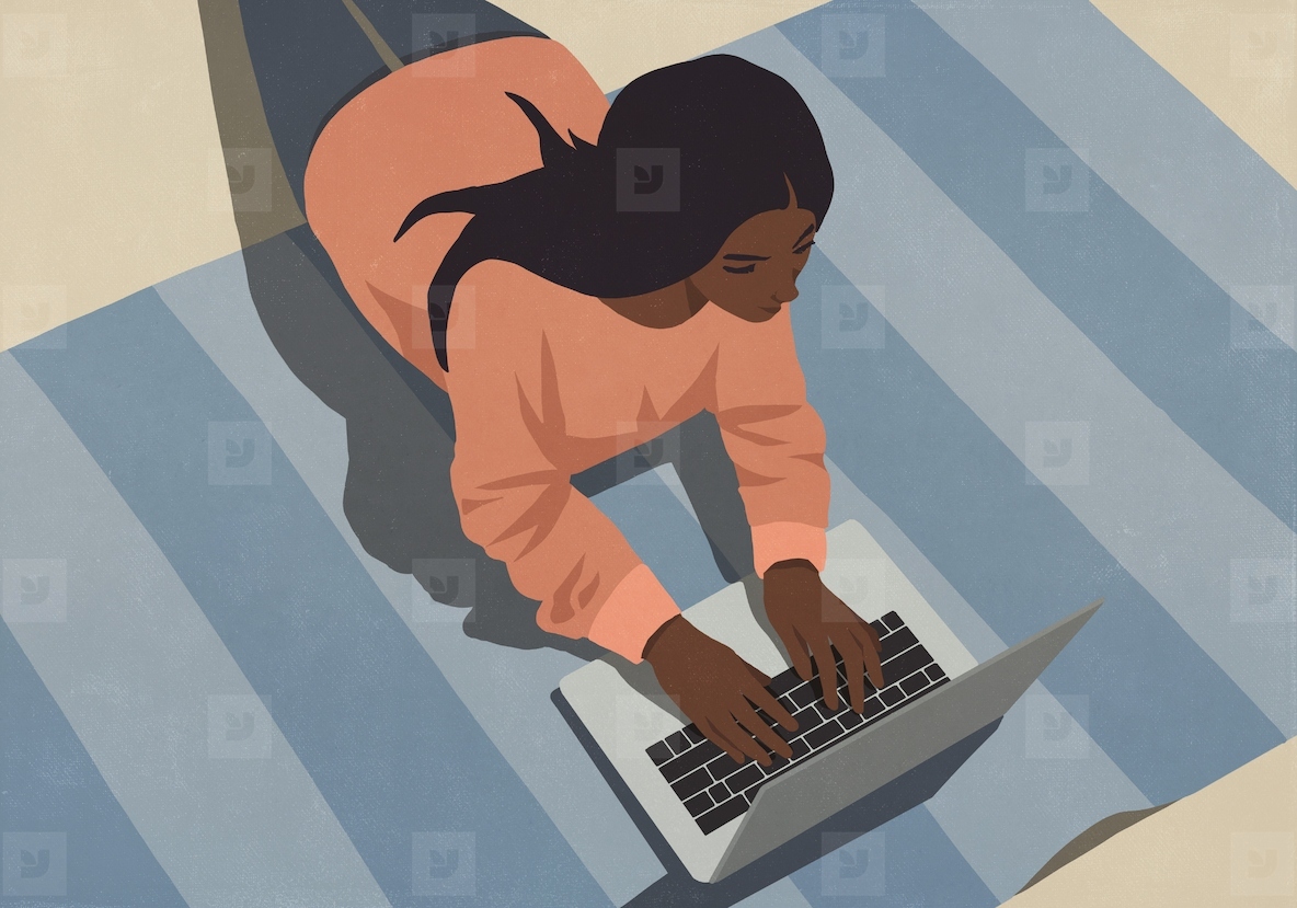 High angle view of woman laying on floor working at laptop