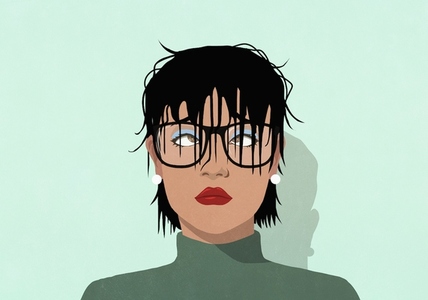 Long bangs hanging over eyeglasses of cross eyed woman