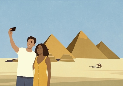 Happy young couple enjoying vacation taking selfie with Egyptian pyramids Happy young couple enjoying vacation taking selfie with Egyptian pyramids