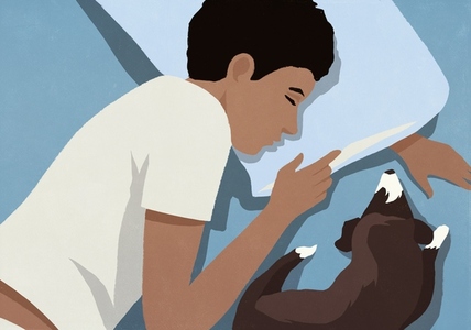 View from above of tired man sleeping next to dog in bed at night