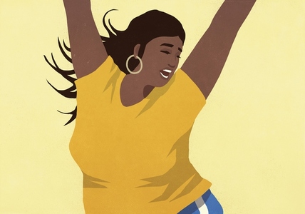 Carefree beautiful overweight woman dancing with arms raised against yellow background