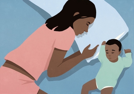 View from above of baby son and mother sleeping side by side in bed