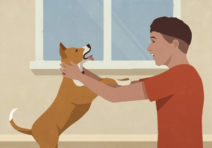 Happy man playing with cute dog by window at home