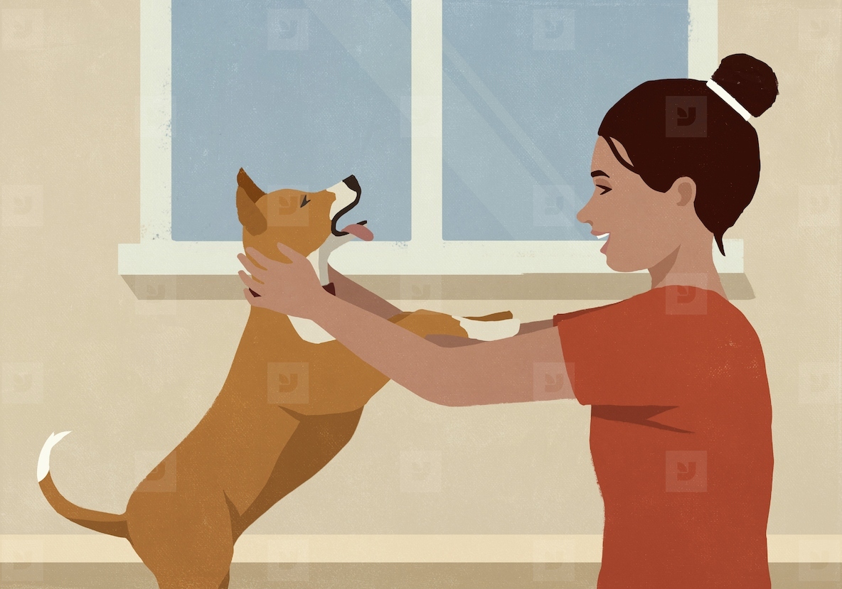 Happy woman playing with pet dog by window at home