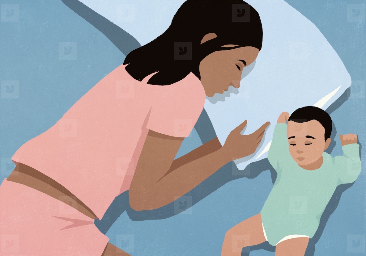 View from above of mother and newborn baby boy sleeping side by side in bed