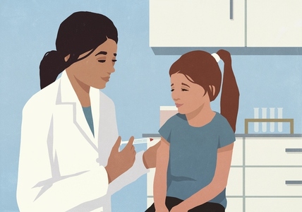 Female pediatrician giving vaccine shot to girl in doctors office at clinic