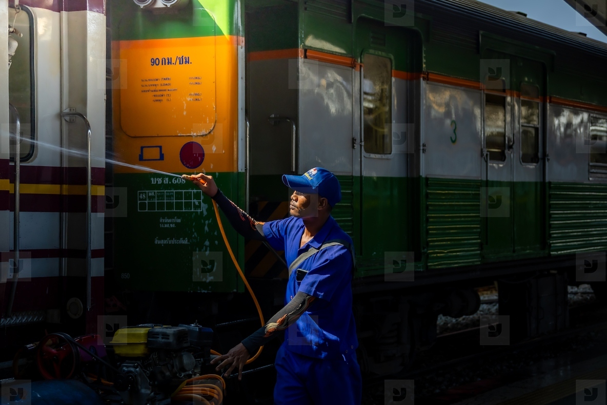 Bangkok Thailand March 3 Workers spray water to clean train