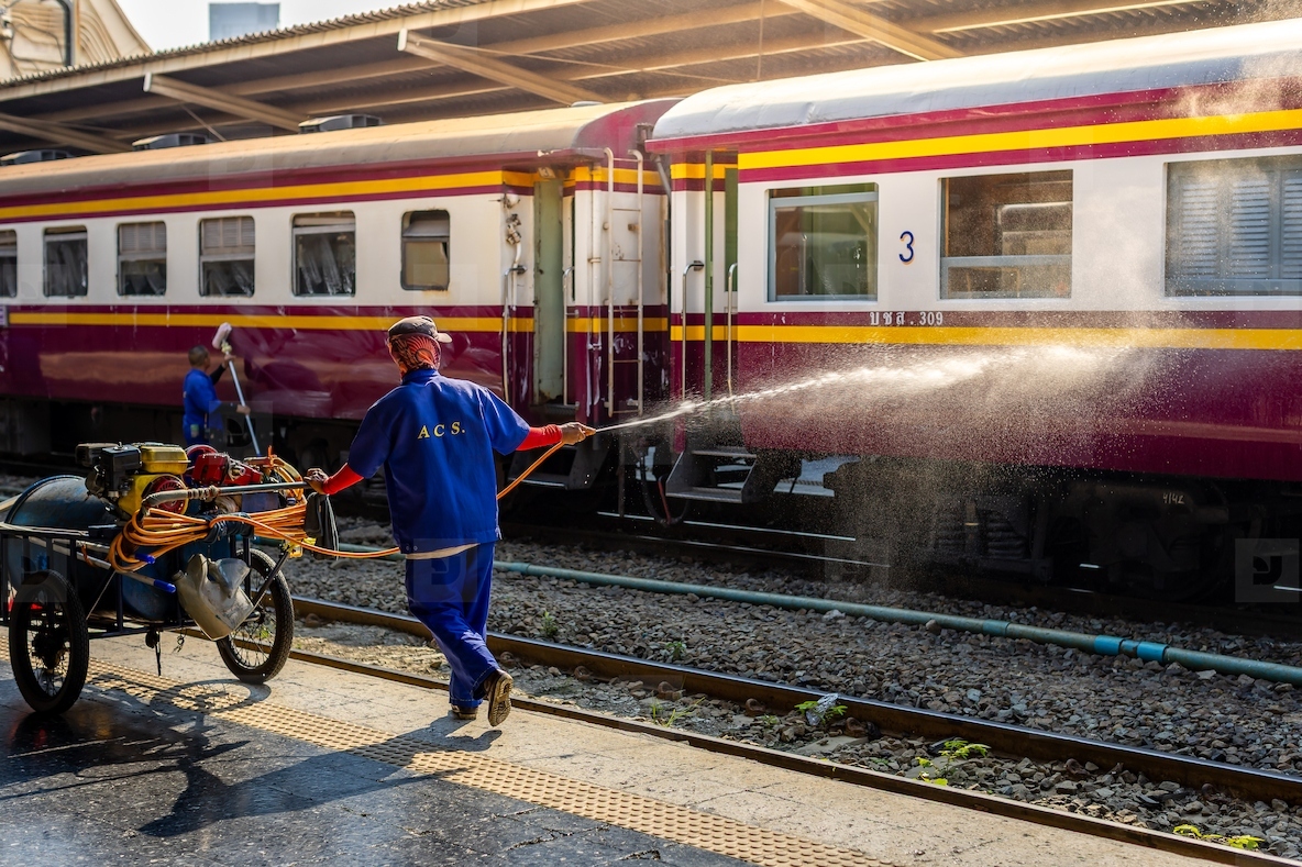 Bangkok  Thailand   March 3  Workers spray water to clean train