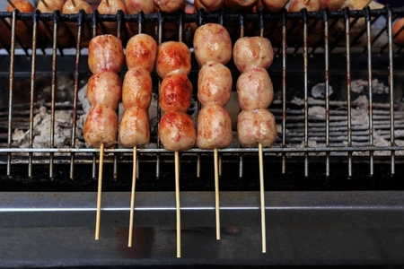 Thailand street food  Grilled Isaan sausages sold on streetsides