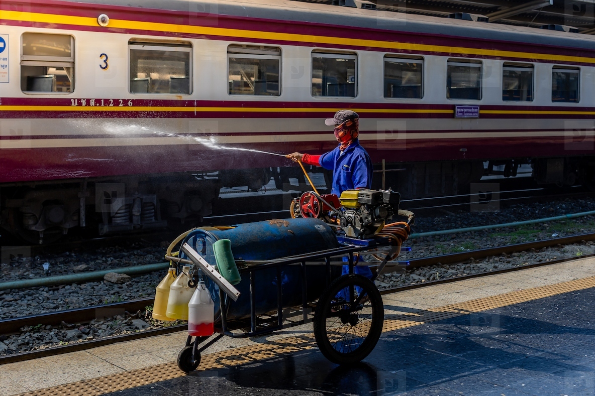 Bangkok  Thailand   March 3  Workers spray water to clean train