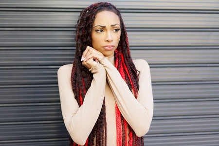 A Stylish Portrait of a Woman with Red Dreadlocks Blending Contemporary Fashion and Urban Life A Stylish Portrait of a Woman with Red Dreadlocks Blending Contemporary Fashion and Urban Life