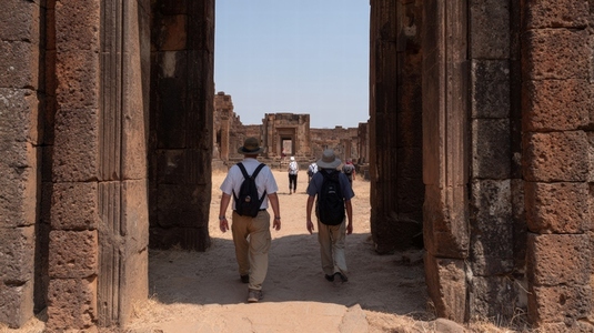 Tourist ancient temple ruin walking stone architecture travel historic outdoors Tourist ancient temple ruin walking stone architecture travel historic outdoors