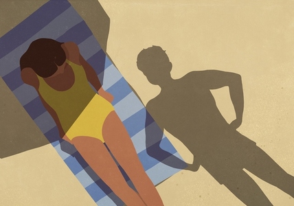 View from above looming shadow of man with hands on hips standing