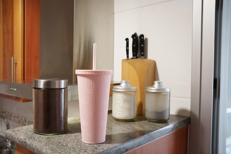 Kitchen scene ambiance Morning breakfast area setting Cozy kitchen with breakfast essentials displayed Everyday morning routine captured on kitchen countertop surface Kitchen scene ambiance Morning breakfast area setting Cozy kitchen with breakfast essentials displayed Everyday morning routine captured on kitchen countertop surface