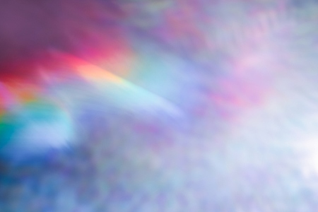 Soft colorful abstract background with blurred light reflections in purple  blue  and pink tones  creating a dreamy gradient texture