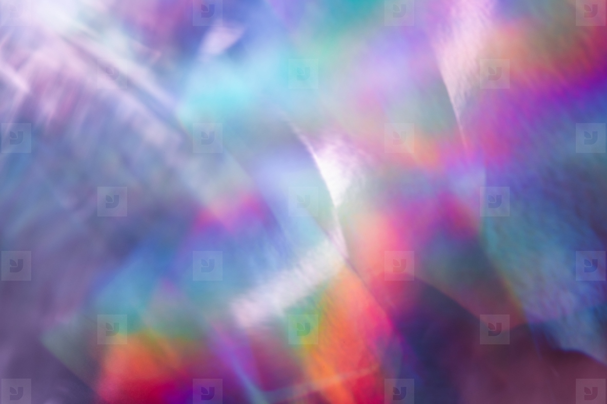 Soft colorful abstract background with blurred light reflections in purple  blue  and pink tones  creating a dreamy gradient texture