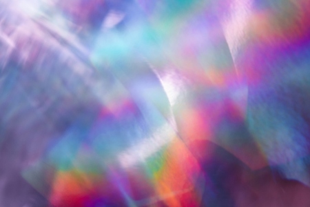 Soft colorful abstract background with blurred light reflections in purple  blue  and pink tones  creating a dreamy gradient texture