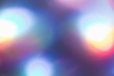 Soft colorful abstract background with blurred light reflections in purple  blue  and pink tones  creating a dreamy gradient texture